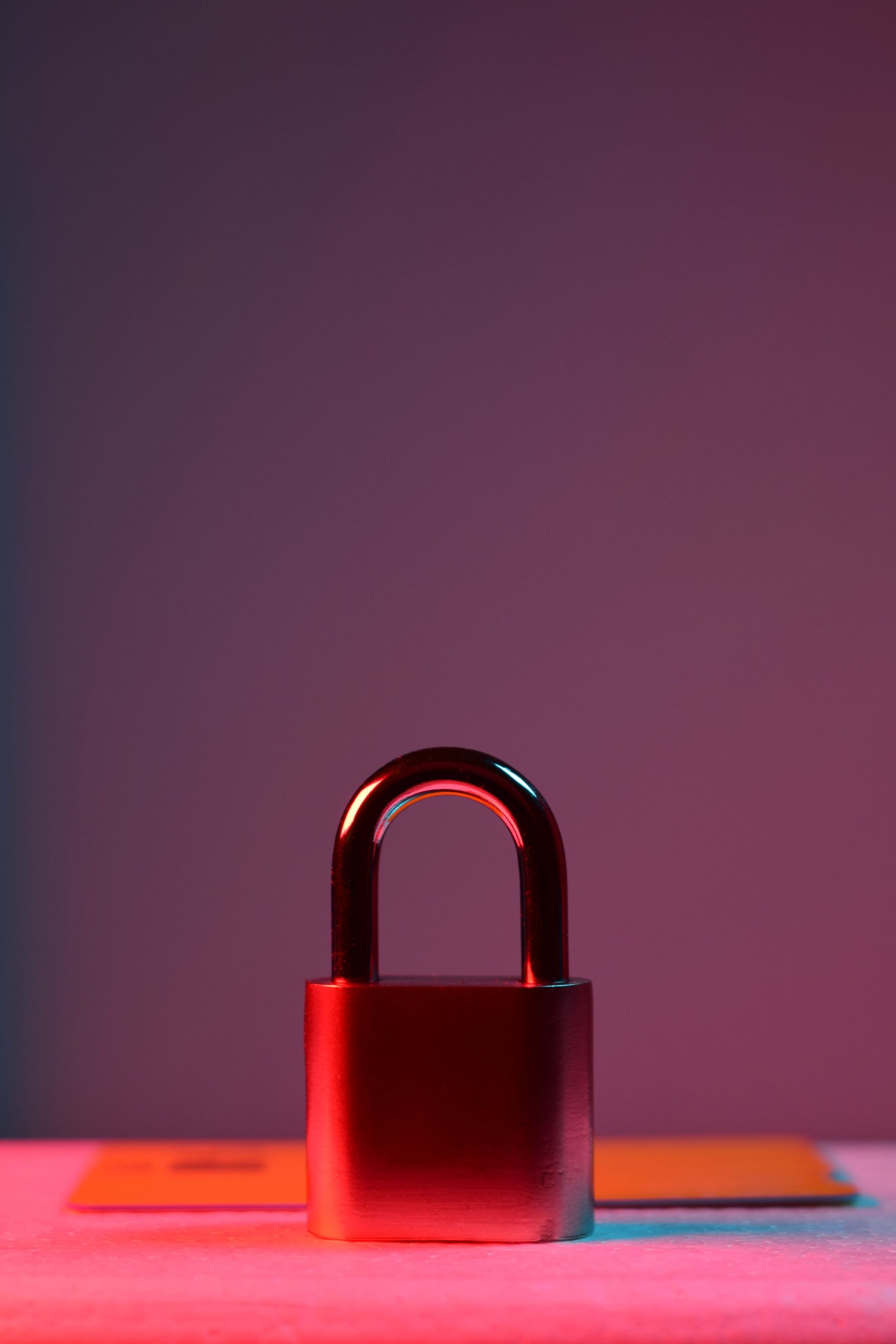 A padlock sits on top of a table.